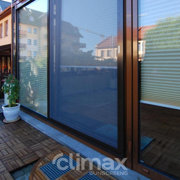 Sliding door insect net in a frame